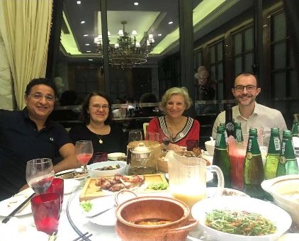 Diva at dinner with a client's procurement team.